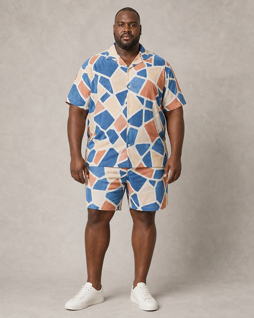 Big and tall man wearing the Azure Tessera Swing pocket-free shirt and matching shorts set, full-body product view