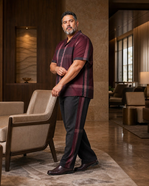 Big and tall man styling the Burgundy Shadow Plaid pocket-free shirt and matching pants set in a lifestyle scene