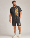 Big and tall man wearing the Canyon Sun Relay t-shirt and matching shorts set, clean full-body studio view