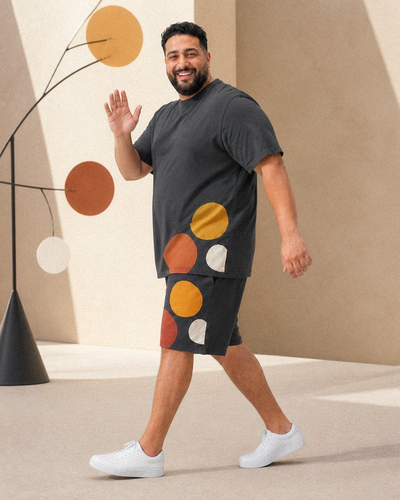 Big and tall man styling the Charcoal Kinetic Dot coordinated outfit in a natural lifestyle scene