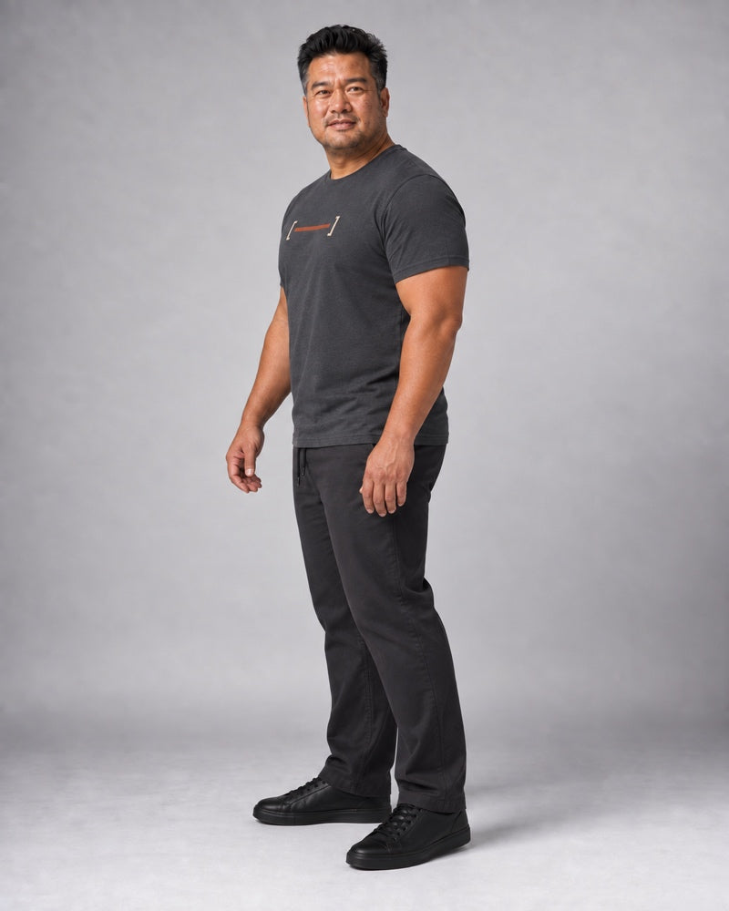 Charcoal Rust Highline Bracket complete t-shirt and pants set, full body studio view