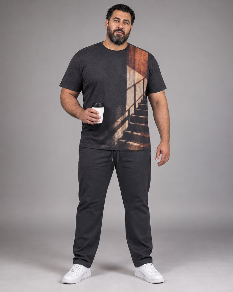 Charcoal Rust Stairwell Light complete T-shirt and pants set, full body studio view