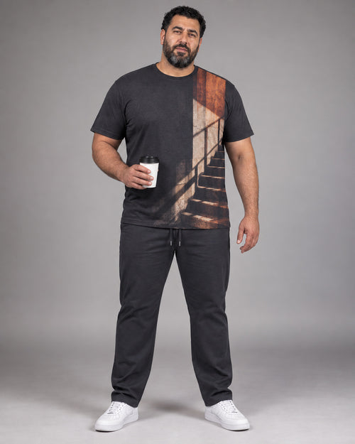 Charcoal Rust Stairwell Light complete T-shirt and pants set, full body studio view