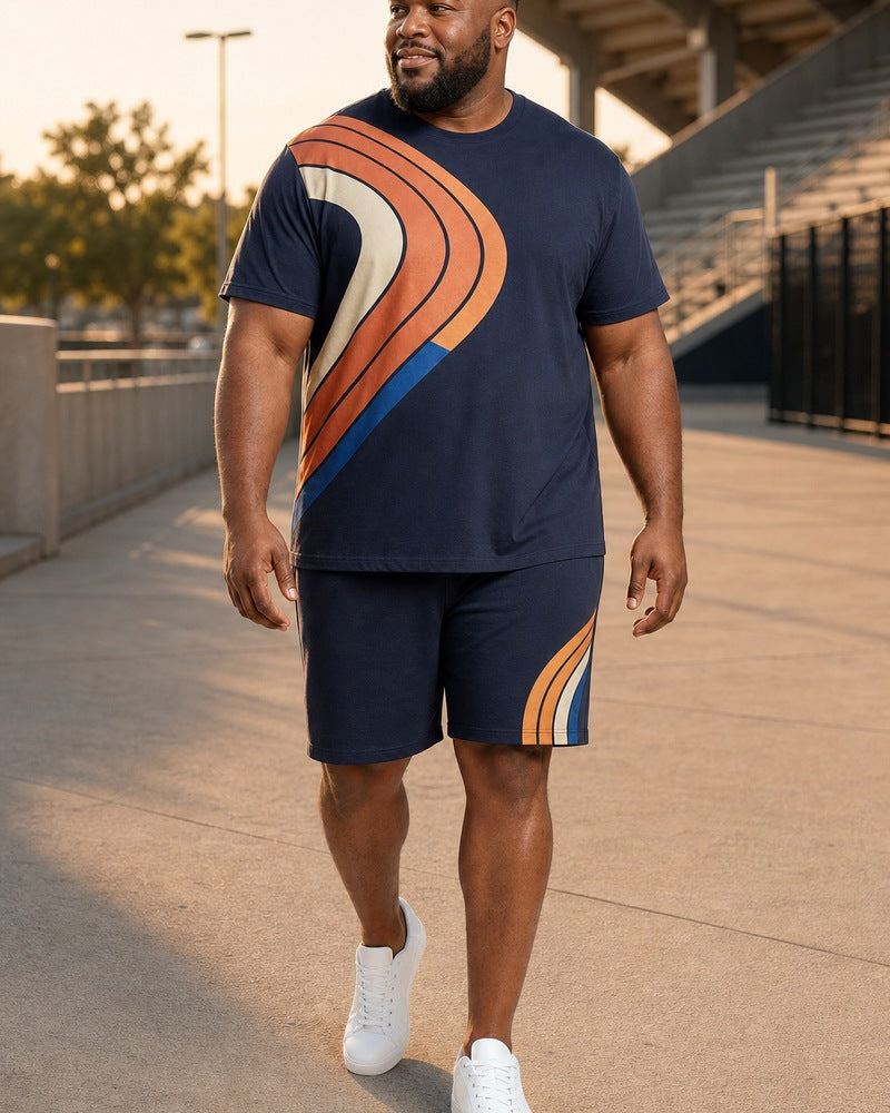 Big and tall man styling the Cinder Track Relay t-shirt and matching shorts set in a natural lifestyle scene