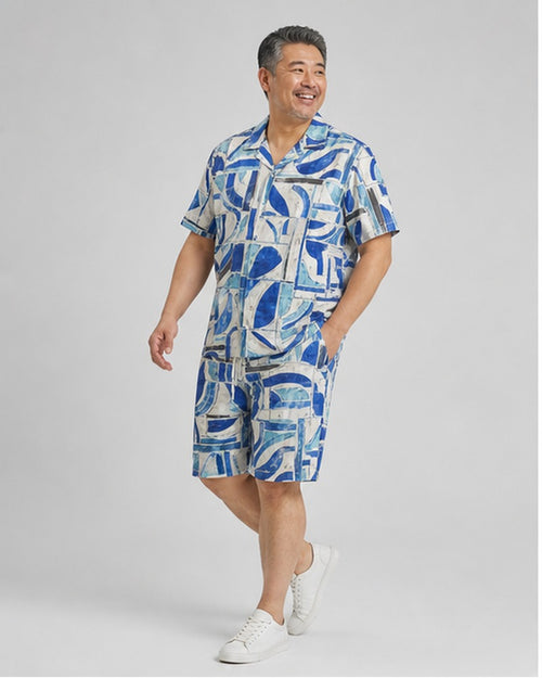 Big and tall man wearing the Coastal Tile Rhythm pocket-free shirt and matching shorts set, clean full-body studio view