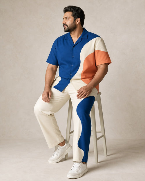 Big and tall man wearing the Cobalt Terrace Cut pocket-free shirt and matching pants set, full-body product view