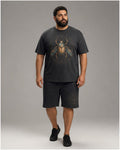 Big and tall man wearing the Copper Scarab Atlas t-shirt and matching shorts set, clean full-body studio view