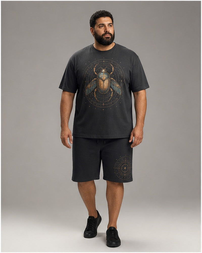 Big and tall man wearing the Copper Scarab Atlas t-shirt and matching shorts set, clean full-body studio view