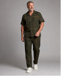 Big and tall man wearing the Copper Windowline pocket-free shirt and matching pants set, clean full-body studio view