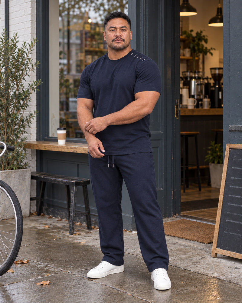 Deep Navy Oat Meridian Notch outfit worn at an ordinary neighborhood coffee roastery exterior