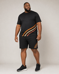 Big and tall man wearing the Ember Turnline T-shirt and matching shorts set, full-body front three-quarter studio view