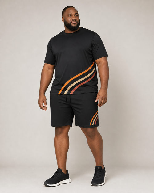 Big and tall man wearing the Ember Turnline T-shirt and matching shorts set, full-body front three-quarter studio view