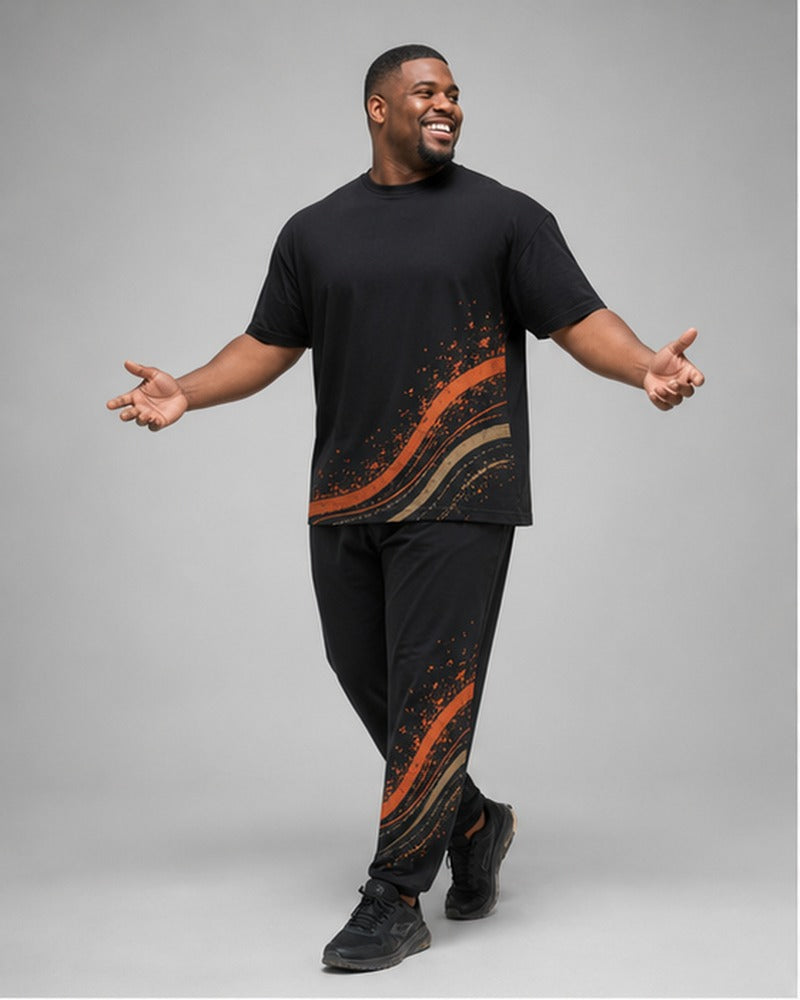 Big and tall man wearing the Ember Velocity Wave t-shirt and matching pants set, clean full-body studio view