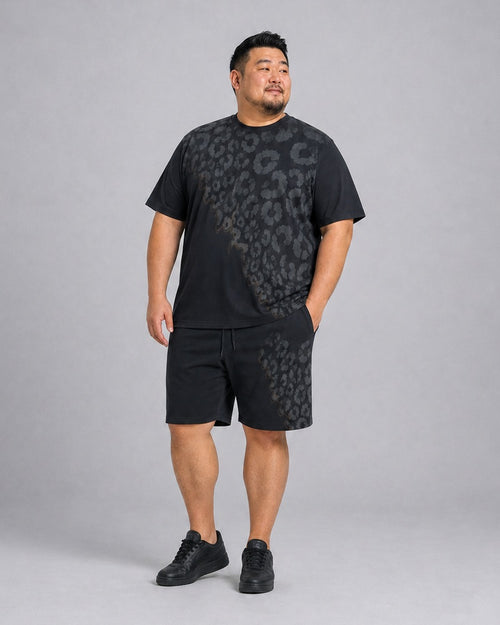 Big and tall man wearing the Graphite Leopard Veil t-shirt and matching shorts set, full-body product view