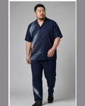Big and tall man wearing the Indigo Brushflow pocket-free shirt and matching pants set, clean full-body studio view