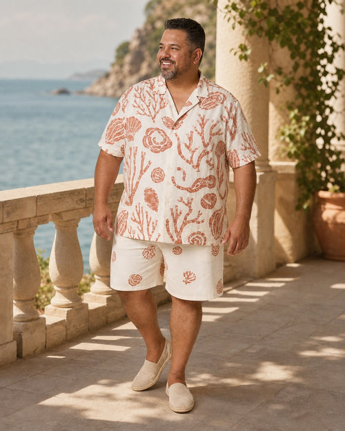Big and tall man styling the Ivory Tidecut pocket-free shirt and matching shorts set in a lifestyle scene
