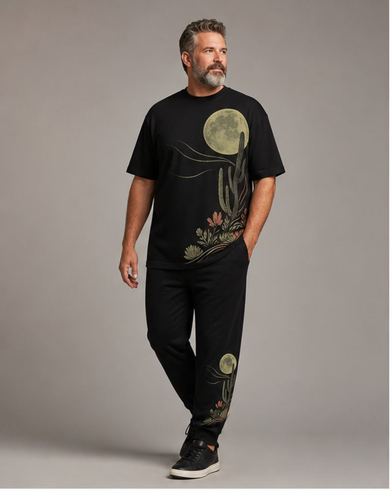 Big and tall man wearing the Lunar Cactus Drift t-shirt and matching pants set, clean full-body studio view