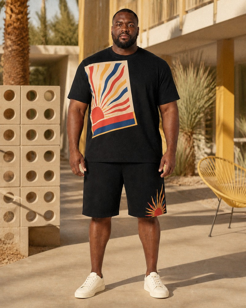 Big and tall man styling the Matchbook Sunburst t-shirt and matching shorts set in a natural lifestyle scene