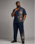 Big and tall man wearing the Midnight Protea pocket-free shirt and matching pants set, clean full-body studio view