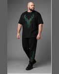 Big and tall man wearing the Neon Stag Circuit t-shirt and matching pants set, clean full-body studio view