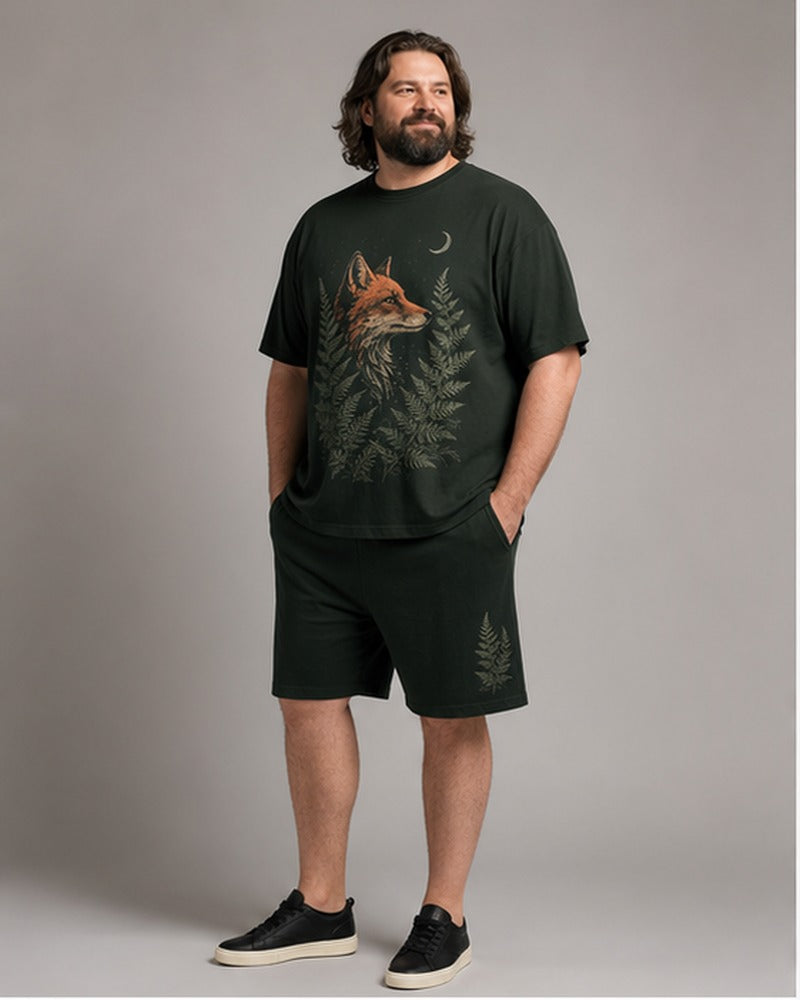 Big and tall man wearing the Night Fox Fern t-shirt and matching shorts set, clean full-body studio view