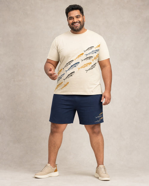 Big and tall man wearing the Ochre Sardine Parade t-shirt and matching shorts set, full-body product view