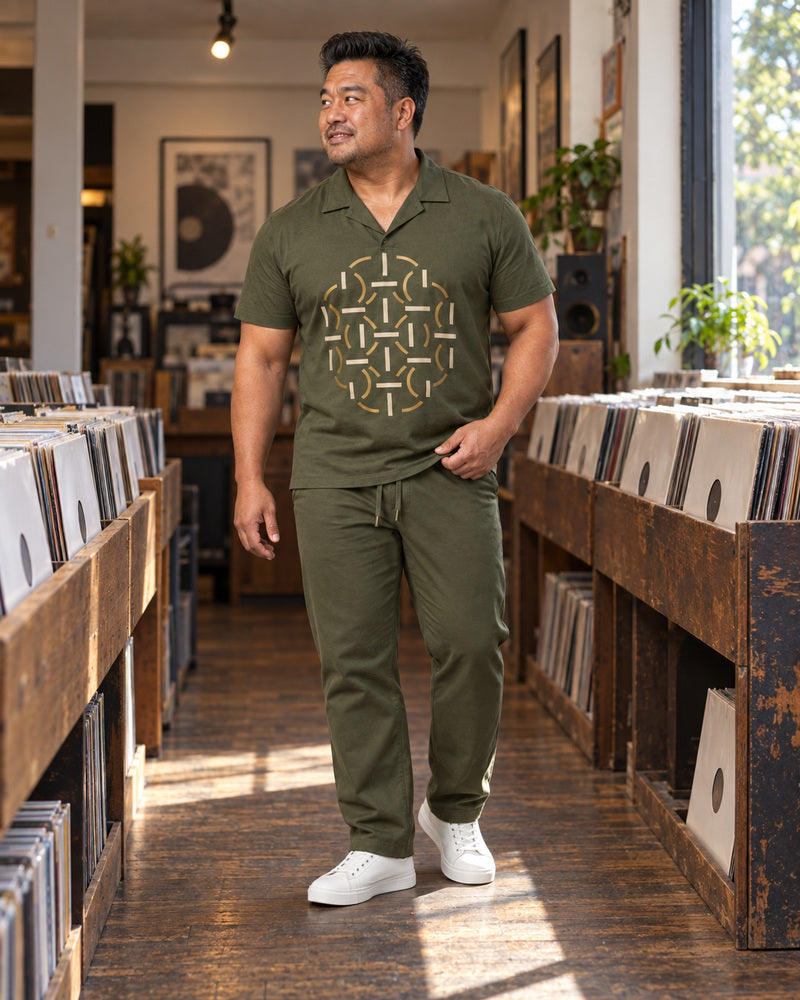 Olive Brass Rotary Lattice outfit worn at an ordinary independent record shop