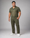 Olive Brass Rotary Lattice complete pocket-free shirt and pants set, full body studio view