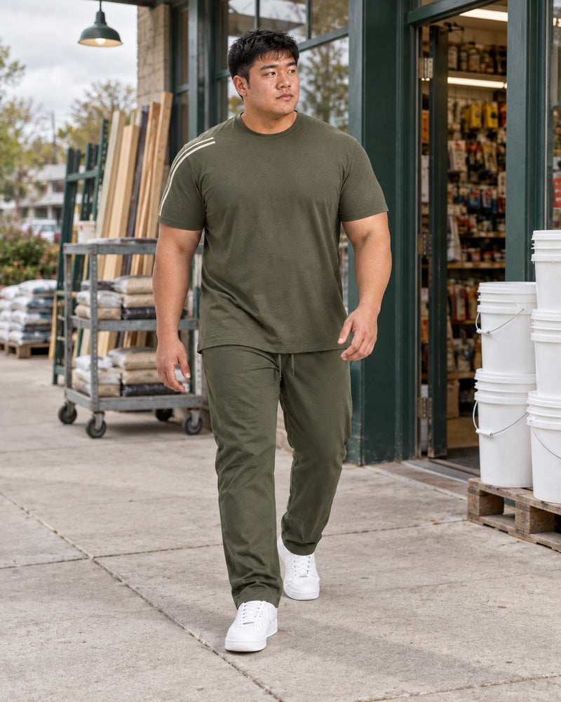 Olive Oat Twin Horizon outfit worn at an ordinary hardware-store sidewalk