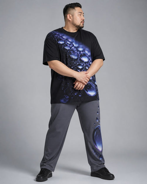 Big and tall man wearing the Onyx Rain Lens t-shirt and matching pants set, full-body product view