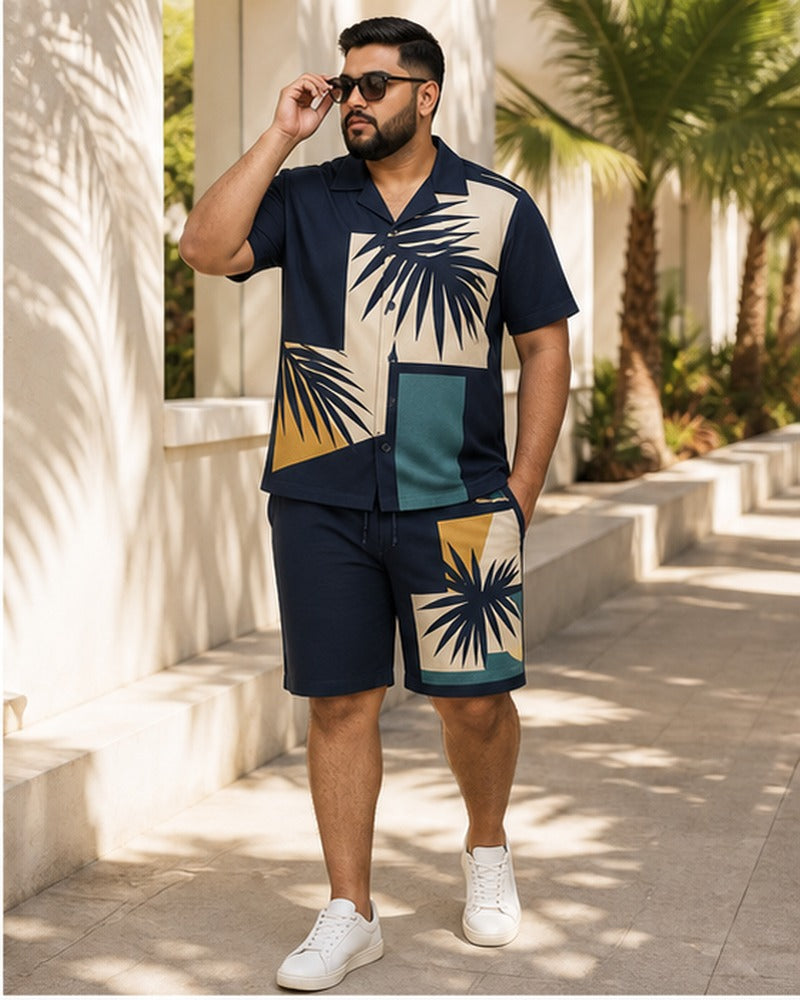 Big and tall man wearing the Palm Shadow Mosaic matching set in a coordinated lifestyle setting