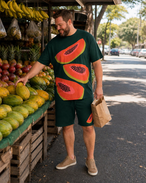 Big and tall man styling the Papaya Block Party t-shirt and matching shorts set in a lifestyle scene