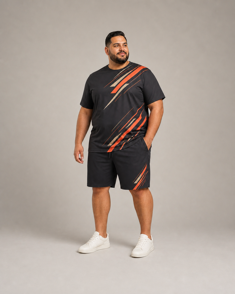 Big and tall man wearing the Persimmon Relay black T-shirt and matching shorts set, front three-quarter view