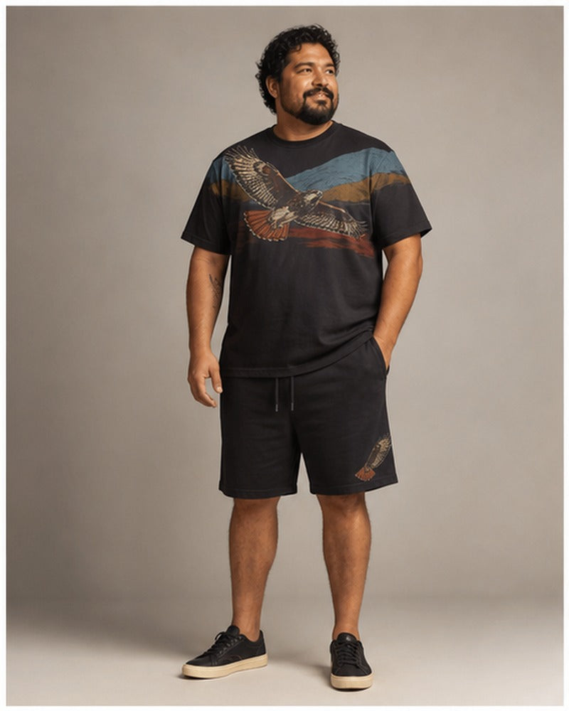 Big and tall man wearing the Redtail Horizon t-shirt and matching shorts set, clean full-body studio view