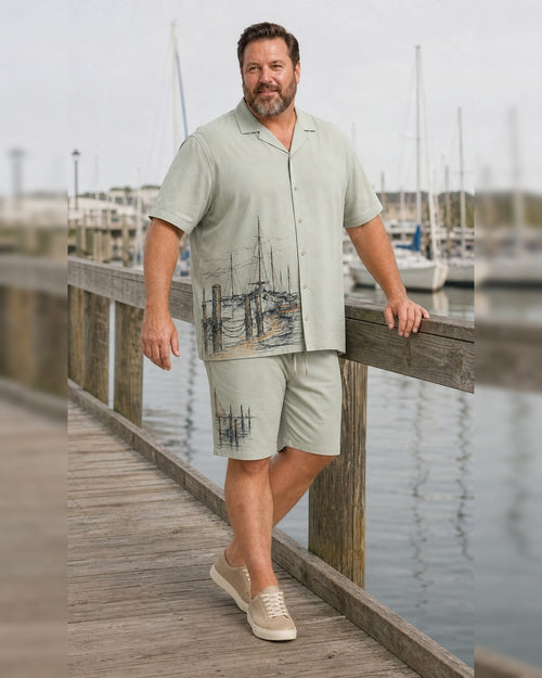 Big and tall man styling the Sage Sand Harbor Sketch pocket-free shirt and matching shorts set in a natural lifestyle scene
