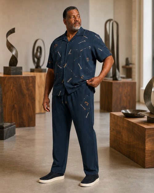 Big and tall man styling the Slate Workshop Constellation pocket-free shirt and matching pants set in a lifestyle scene