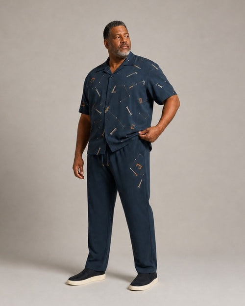 Big and tall man wearing the Slate Workshop Constellation pocket-free shirt and matching pants set, full-body product view