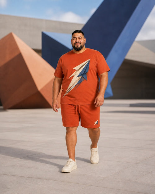 Big and tall man styling the Terracotta Folded Meteor t-shirt and matching shorts set in a lifestyle scene