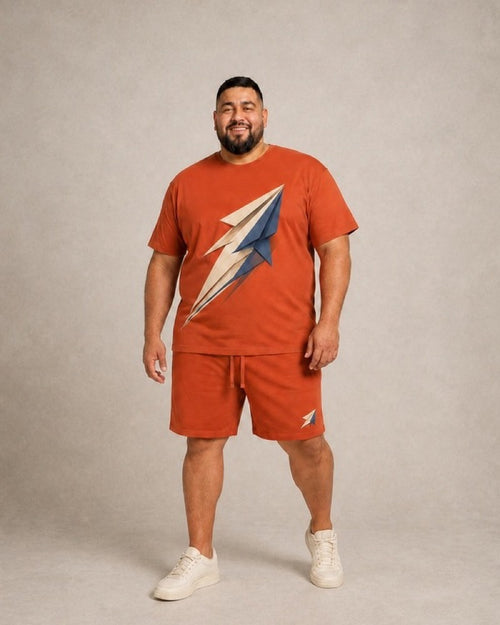 Big and tall man wearing the Terracotta Folded Meteor t-shirt and matching shorts set, full-body product view