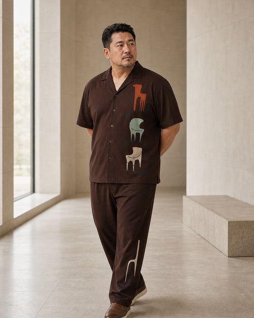 Big and tall man styling the Umber Chair Museum pocket-free shirt and matching pants set in a natural lifestyle scene