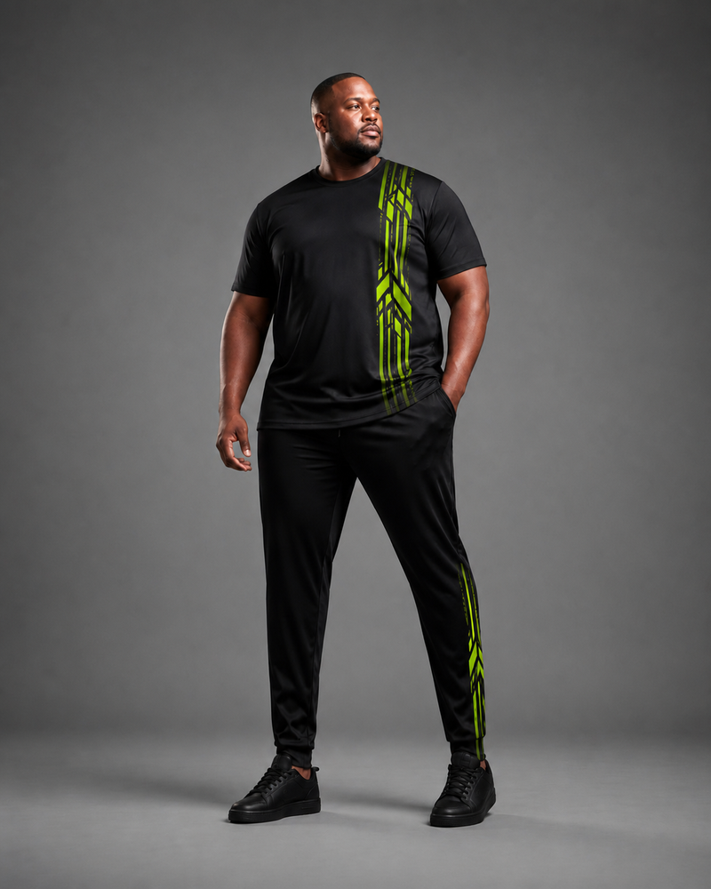 Big and tall man wearing the Wasabi Night Shift black T-shirt and matching pants set, front three-quarter view