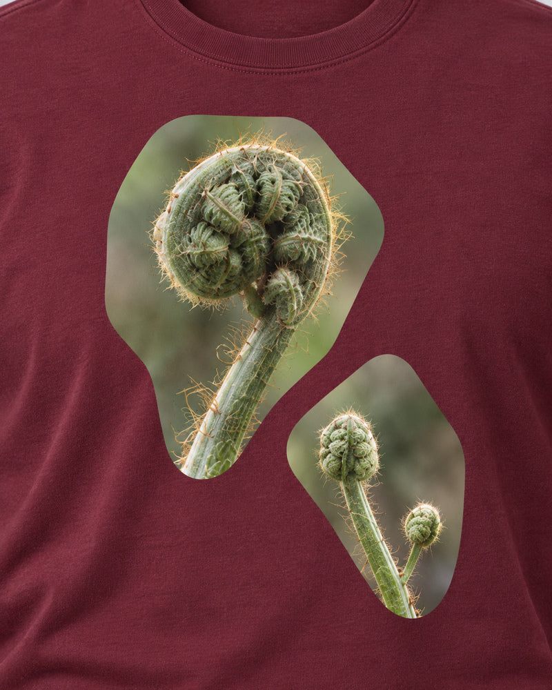 Burgundy Fern Unfurl graphic and garment details