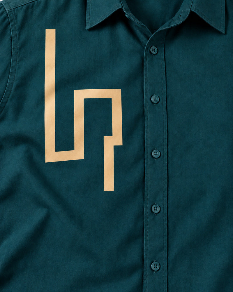 Deep Teal Open Labyrinth graphic and garment details