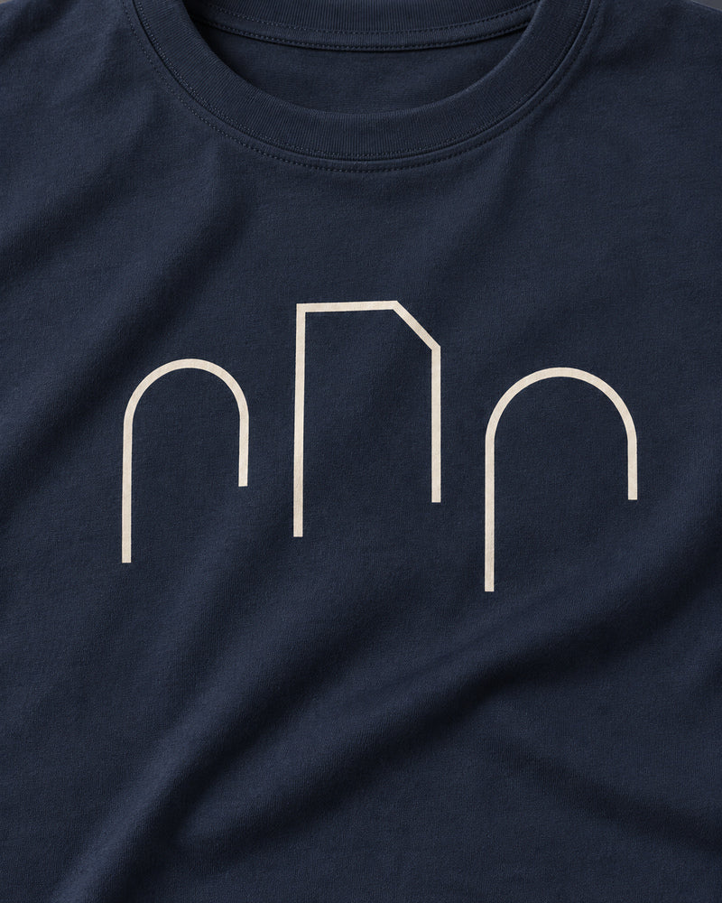 Navy Unequal Gates graphic and garment details