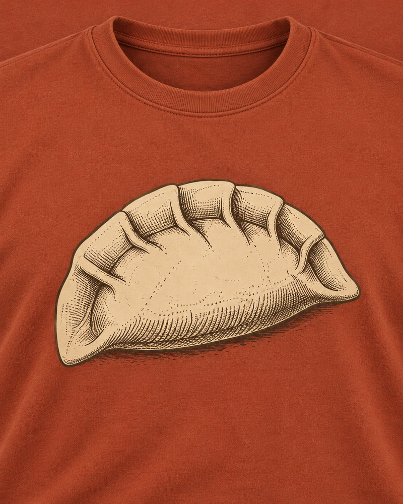 Rust Dumpling Fold graphic and garment details