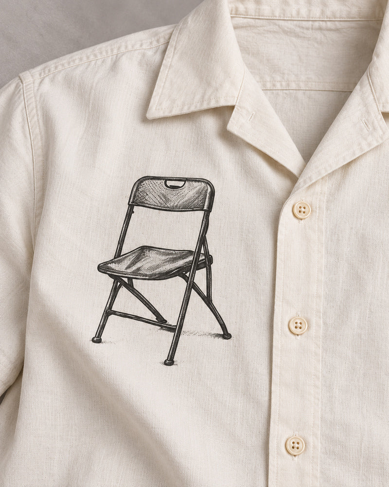 White Folding Chair graphic and garment details