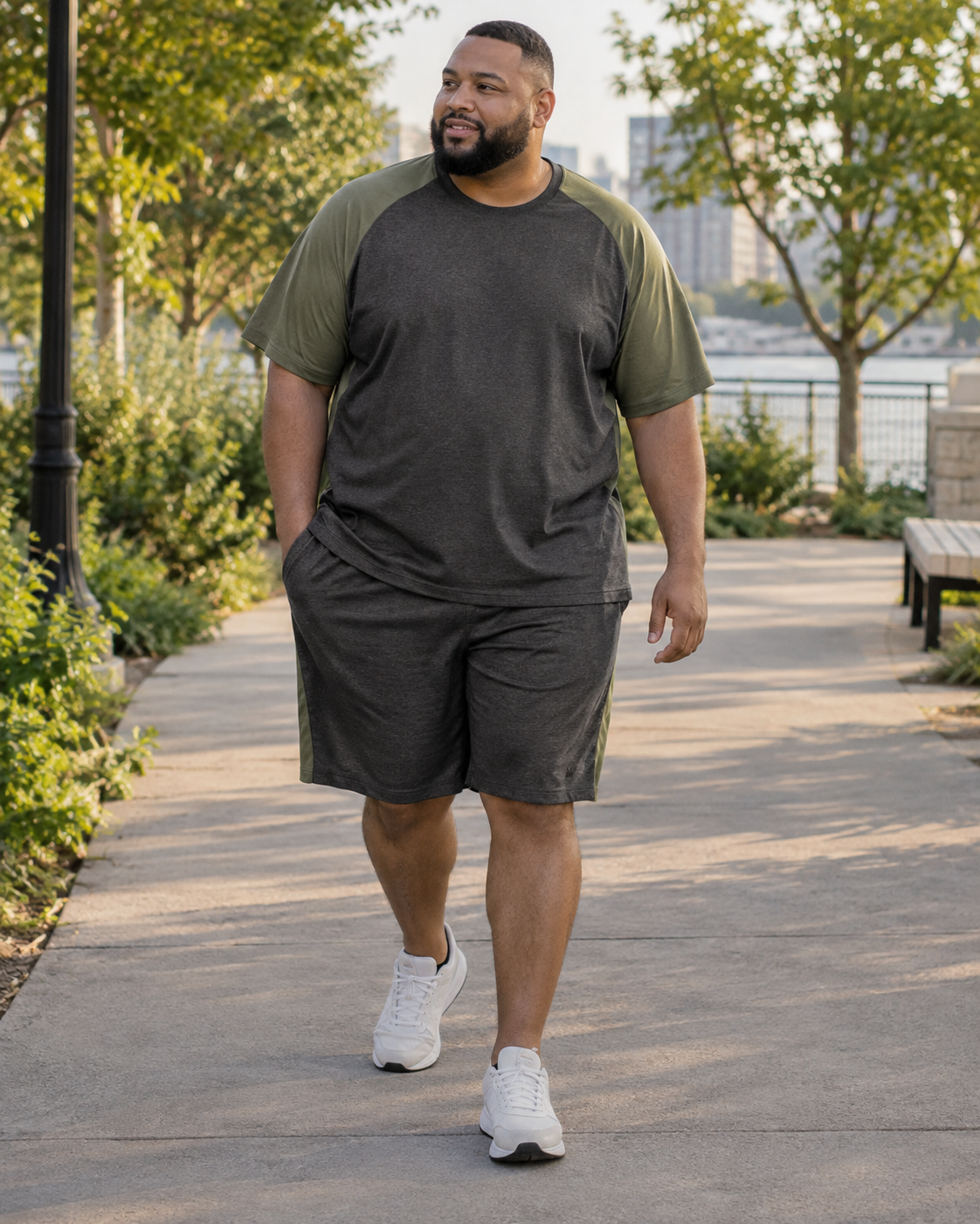 Big and tall man wearing a coordinated weekend T-shirt and shorts set